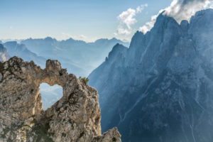 Europe, Italy, Veneto, Belluno, Agordino. The heart of rock, a natural hole in the shape of a heart, Pala group, Dolomites Europe, Italy, Veneto, Belluno, Agordino. The heart of rock, a natural hole in the shape of a heart, Pala group, Dolomites